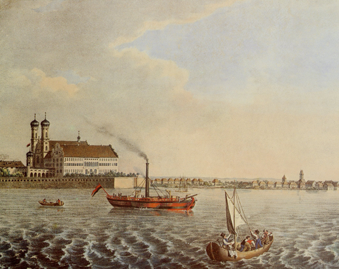 Schiffe auf Wasser vor Ufer mit Kirche